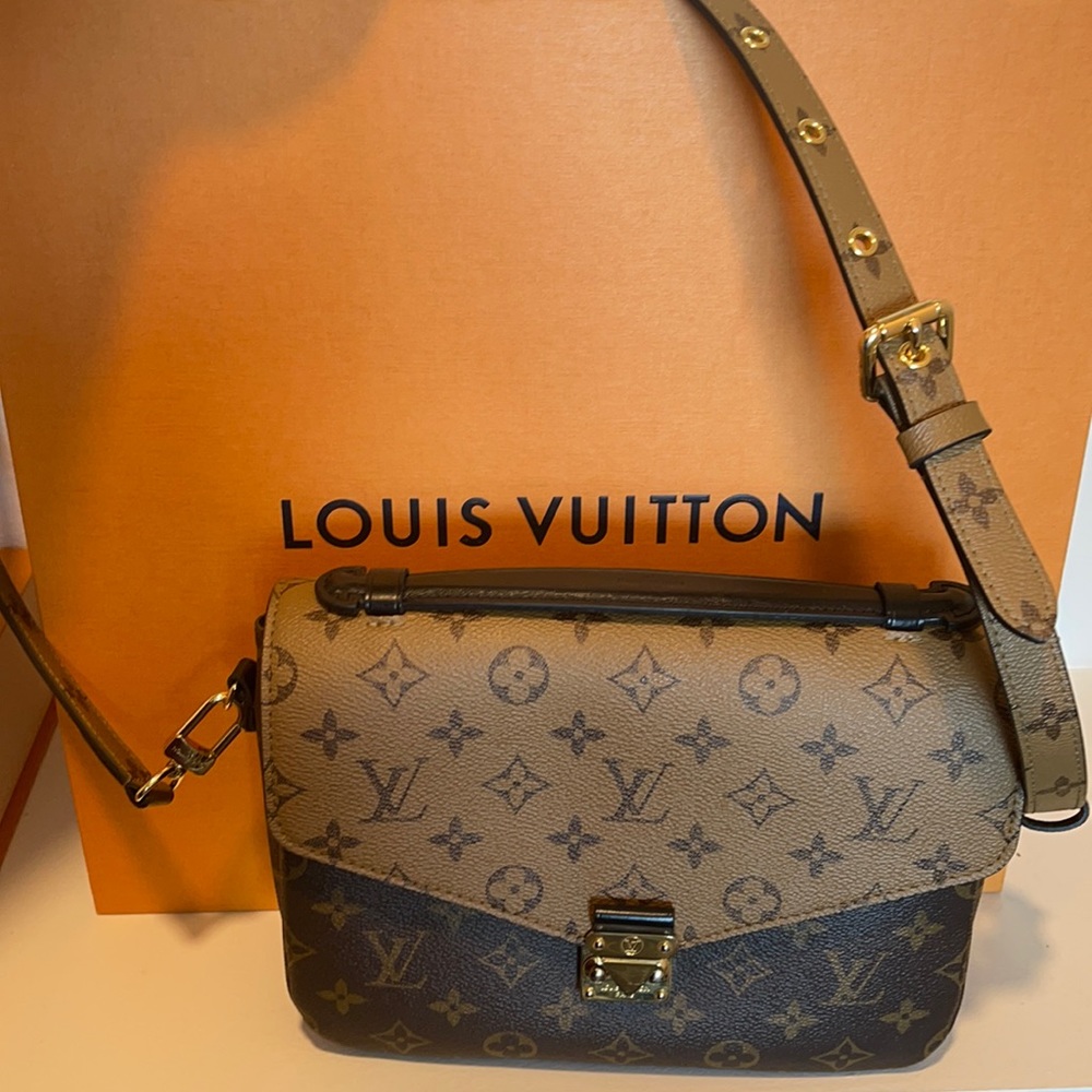 Crossbody LV dual clutch bag